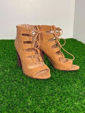 Brown suede bloc heels with wrap around cord and stud details